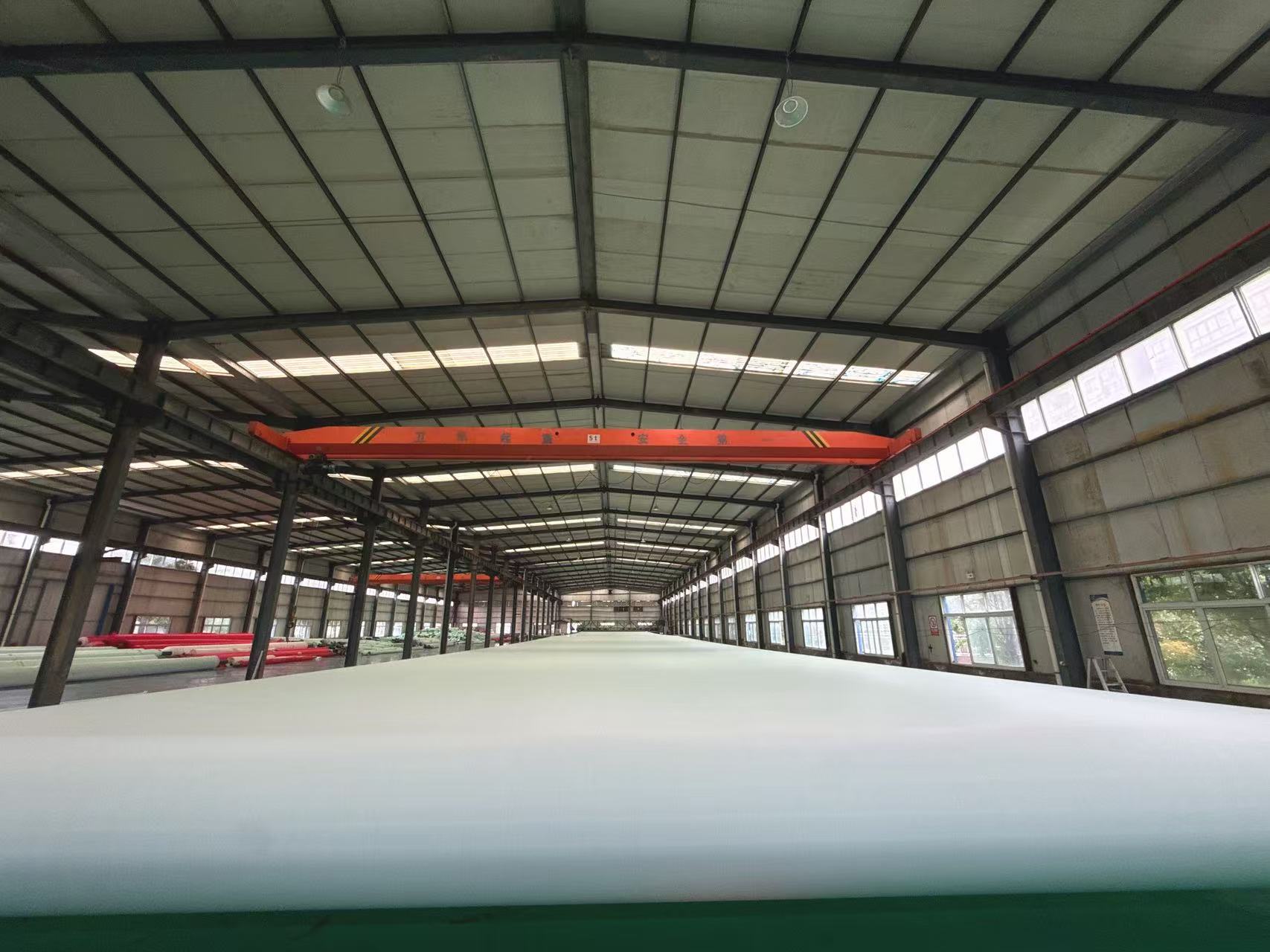 Paper machine fabric production workshop